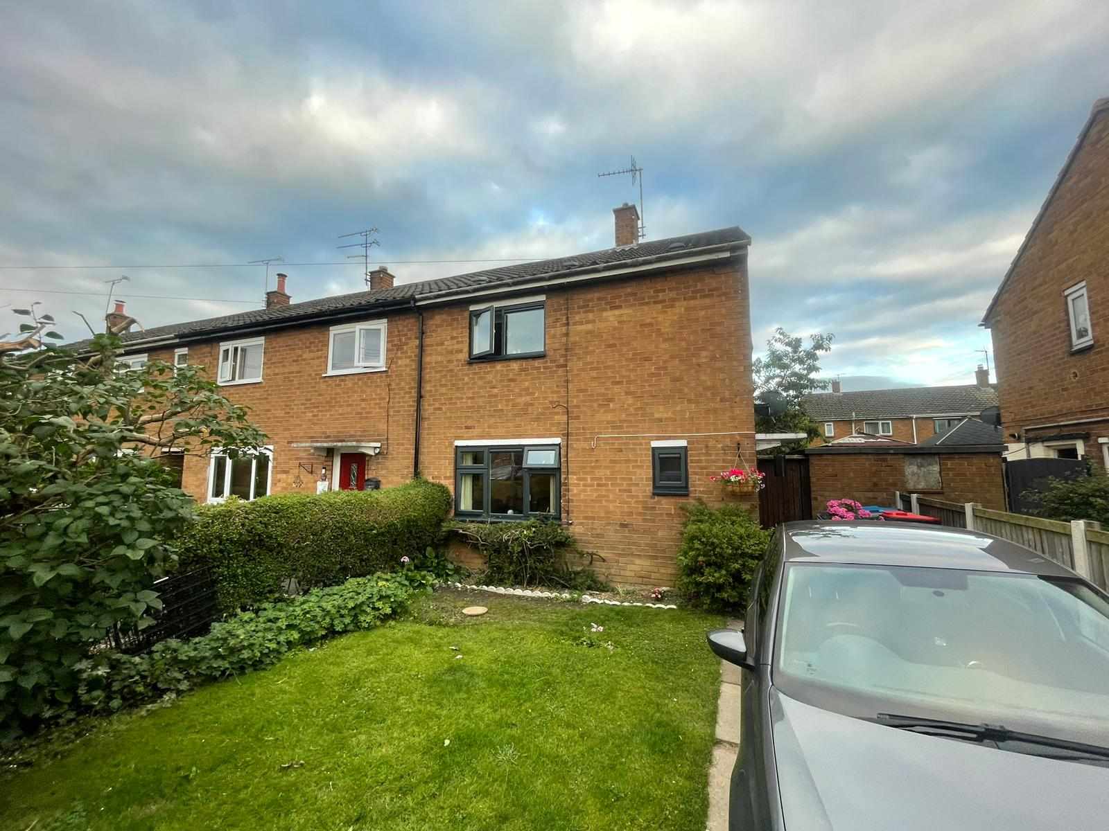 Home with newly sprayed grey windows