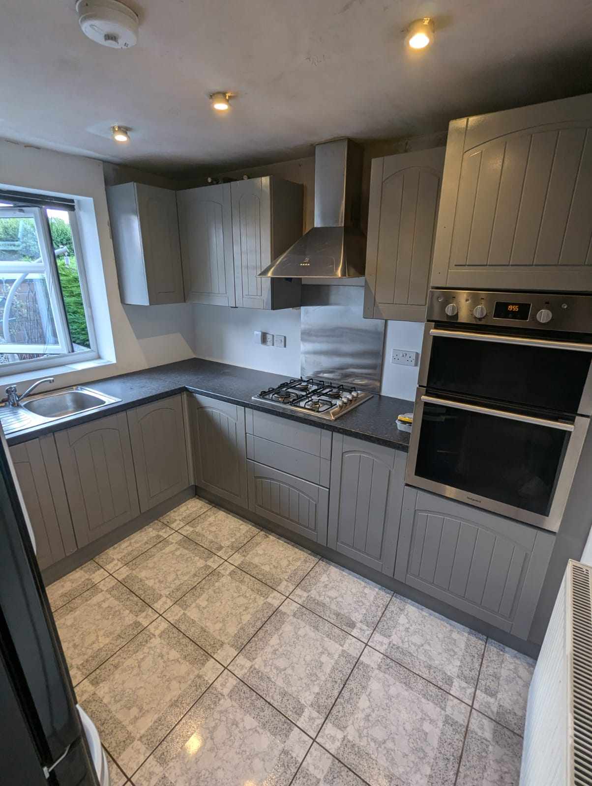 Grey kitchen after spray